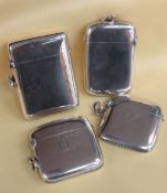 FOUR SIMILAR SILVER VESTA CASES, two plain and two with engraved initials, Birmingham and Chester