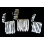 THREE SIMILAR SILVER VESTA CASES of reeded form, Birmingham & London hallmarks, 62.5gms overall (