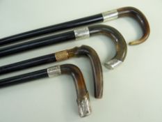 FOUR VINTAGE WALKING STICKS, all with ram's horn handles, one with gold plated copper collar,