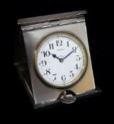 GEORGE V ASPREY SILVER TRAVELLING WATCH, Chester 1913, engine turned folding case with 8-day