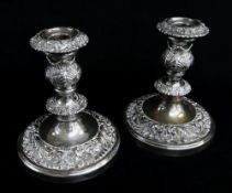 PAIR VICTORIAN OLD SHEFFIELD PLATE CANDLESTICKS, profusely ornamented in embossed acanthus