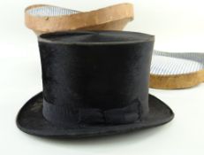 BATTERSBY & CO. (LONDON) TOP HAT, & HATBOX. in leather Comments: Fair, worn along edges, brim worn,