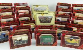 MATCHBOX DIECAST MODELS OF YESTERYEAR: thirty-one 1980s maroon-boxed commercial vans, and eight