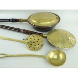 ANTIQUE BRASS ORNAMENTS, including chestnut roaster, ladle and two warming pans, largest 110cms (4)