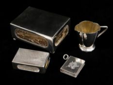 ASSORTED SILVER ITEMS comprising two silver match box holders, small silver jug, small silver