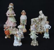 ASSORTED CONTINENTAL PORCELAIN FIGURINES including Austrian figure of a girl reading a book (9)