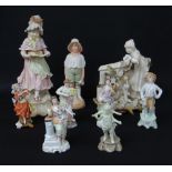 ASSORTED CONTINENTAL PORCELAIN FIGURINES including Austrian figure of a girl reading a book (9)