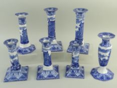 SEVEN CAULDON 'BLUE CHARIOTS' BLUE & WHITE' PRINTED CANDLESTICKS, including two pairs with square