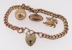 9CT GOLD CHARM BRACELET, curb link, with three 9ct gold charms comprising rugby ball, football and