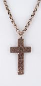FLORALLY ENGRAVED CROSS PENDANT on 9ct gold chain, the chain weighing 6.9gms