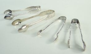 FOUR VICTORIAN SUGAR TONGS comprising sugar tongs of heart design, London 1851 (Robert Wallis),