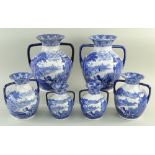 THREE PAIRS CAULDON 'BLUE CHARIOTS' BLUE & WHITE' PRINTED HANDLED VASES, of 'Partland vase' form,
