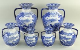 THREE PAIRS CAULDON 'BLUE CHARIOTS' BLUE & WHITE' PRINTED HANDLED VASES, of 'Partland vase' form,