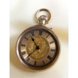 18K GOLD FOB WATCH, overall engraved, the dial having Roman numerals and foliate decoration, 45.8gms