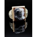 10K GOLD HARDSTONE CAMEO RING, the square-shape sardonyx panel possibly depicting Hector & Achilles