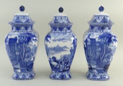 SET OF THREE CAULDON 'BLUE CHARIOTS' BLUE & WHITE' PRINTED BALUSTER VASES & COVERS of tapering
