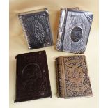 FOUR BOOK DESIGN VESTA CASES, comprising brass Edward VII example, bakelite Edward VII example,