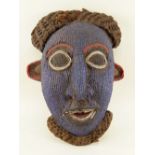 CAMEROONS GRASSLANDS BEADED MASK, with woven fibre beard of coiffure, 35cms high