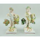 A RARE PAIR OF SWANSEA CAMBRIAN POTTERY PUTTI in the form of swag wearing flower pickers and their