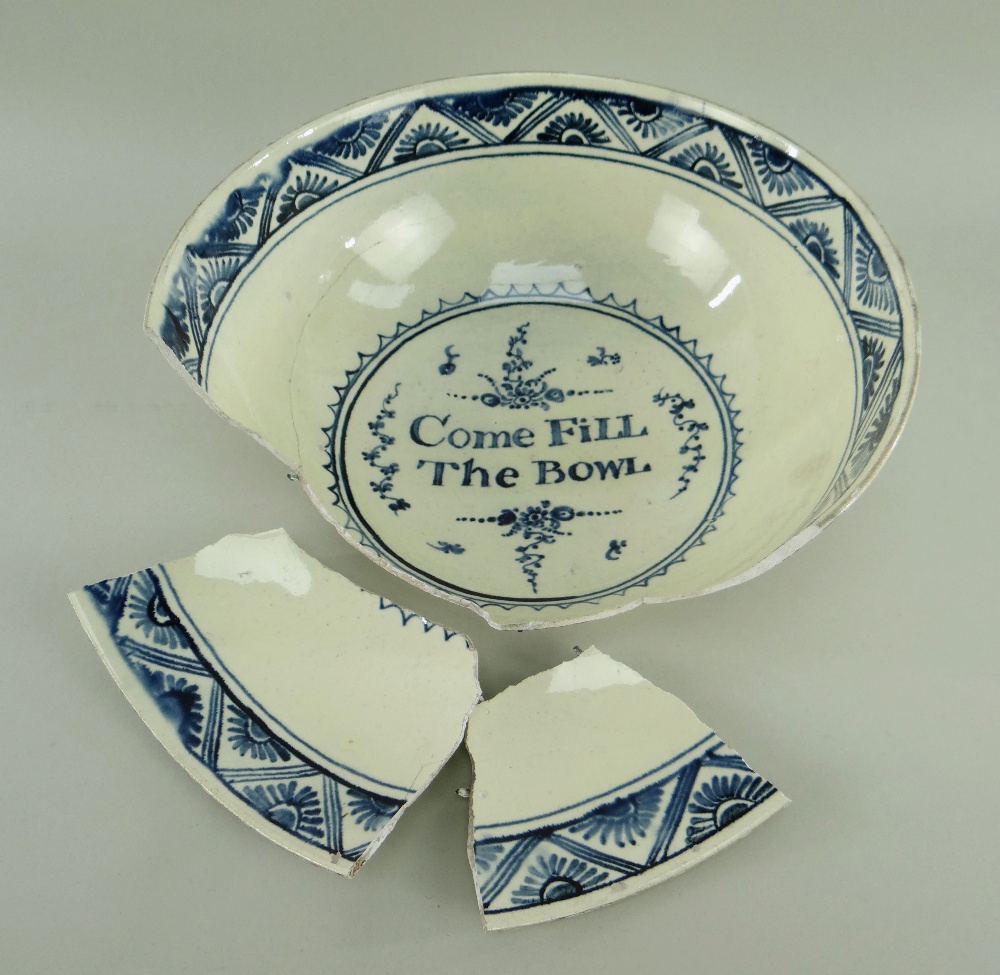 LATE 18TH CENTURY CAMBRIAN POTTERY BOWL decorated in underglazed blue swags and floral tiles to