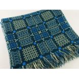 VINTAGE WELSH TAPESTRY BLANKET of geometric design, racing-green ground with yellow and blue detail,