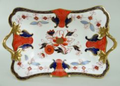 A SWANSEA PORCELAIN CENTRE DISH WITH TWIG HANDLES of footed rectangular form, handles picked out
