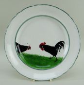 LLANELLY POTTERY COCKEREL & HEN PLATE with green inner and outer border, Llanelly marked base, 24cms