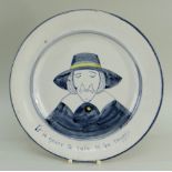 A LLANELLY POTTERY PLATE WITH PORTRAIT OF A PURITAN with amusing grammar mistake, painted in blue