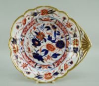 A SWANSEA PORCELAIN SHELL HANDLED DISH handle picked out in gold, decorated in Japan pattern No.233,