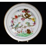 A SWANSEA PORCELAIN PLATE WITH 'PARAKEETS IN A TREE' PATTERN with both birds chained to a gnarled