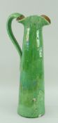 TALL EWENNY SLIPWARE POTTERY TAPERED JUG with loop handle and curvaceous neck, green glaze, signed