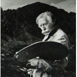 NICHOLAS SINCLAIR black and white photograph - Sir Kyffin Williams RA at work in overcoat with