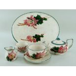 A LLANELLY POTTERY FIVE-PIECE CABARET SET comprising oval tray, teapot, cream-jug, sugar basin and