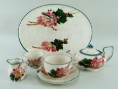 A LLANELLY POTTERY FIVE-PIECE CABARET SET comprising oval tray, teapot, cream-jug, sugar basin and