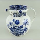 A SWANSEA CAMBRIAN PUZZLE JUG circa 1810, ovoid shape and loop handle, with cylindrical neck pierced
