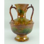 EWENNY POTTERY LARGE TWIN-HANDLED AMPHORA SHAPED VASE in mottled green and brown glaze, bulbous