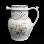 A SWANSEA CAMBRIAN PUZZLE JUG circa 1800 baluster form, loop handle, with cylindrical neck pierced