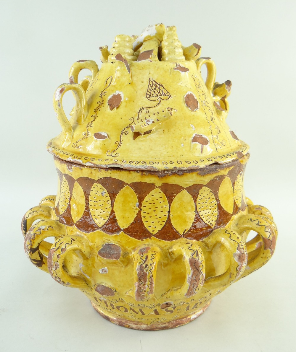 AN IMPORTANT EWENNY POTTERY SLIPWARE WASSAIL BOWL & COVER, DATED 1823 glazed in yellow over red with