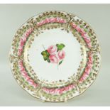 A NANTGARW PLATE DECORATED WITH ROSES in the Derby style centred with three roses and leaves, the