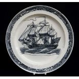 A CAMBRIAN SWANSEA PEARLWARE SHIP PLATE circa 1800, transfer decorated in ink-blue with a brig in