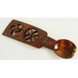 19TH CENTURY SYCAMORE CARVED LOVE-SPOON decorated with pierced treskelion motif over a pierced