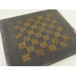 19TH CENTURY WELSH SLATE CHEQUER BOARD with sgraffito and gilded squares, 40 x 35cms Provenance: