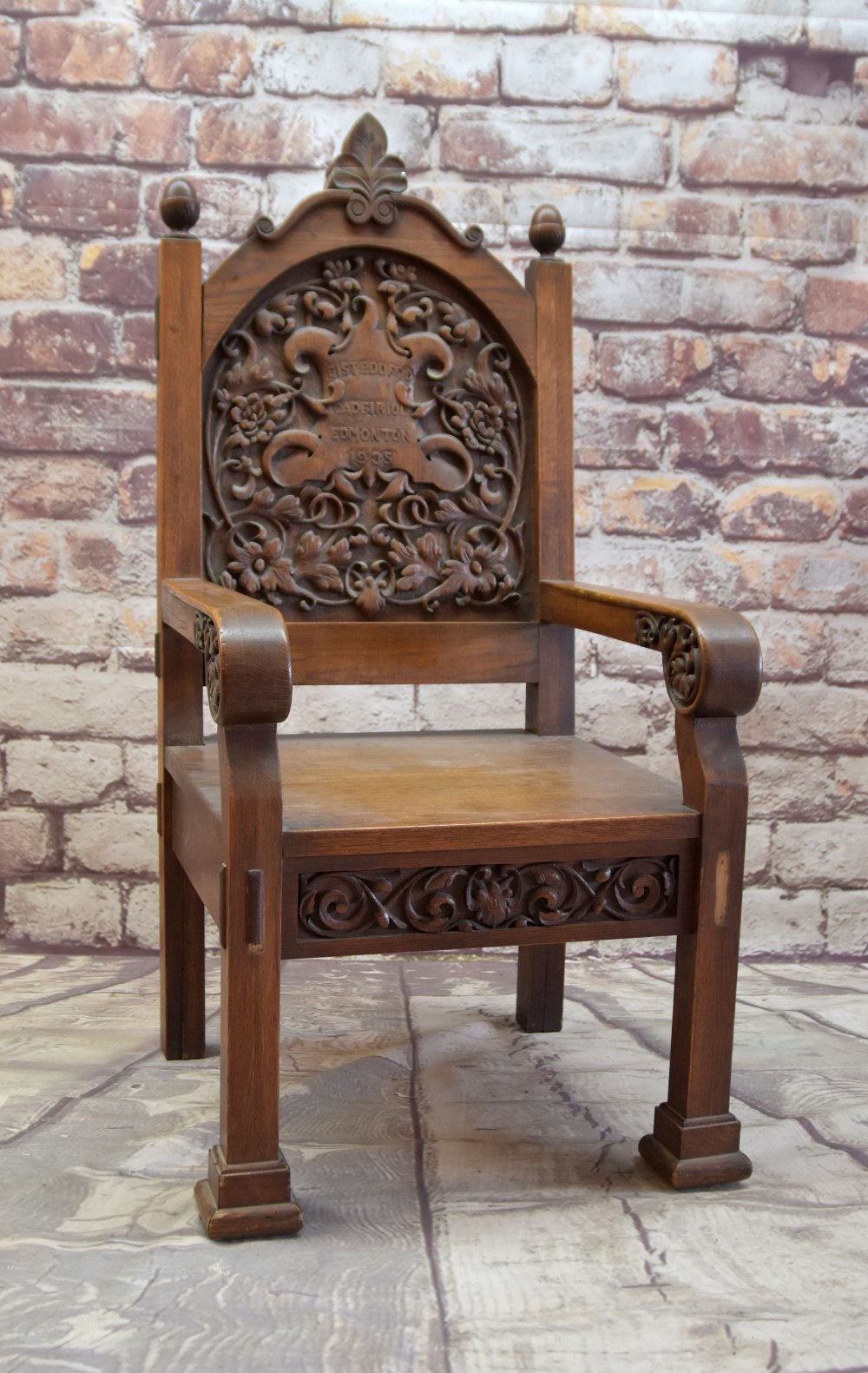 1935 EISTEDDFOD CHAIR FOR EDMONTON (NORTH LONDON) oak, carved inscription within cartouche and