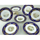 A STAFFORDSHIRE PORCELAIN DESSERT SET PAINTED WITH NAMED WELSH VIEWS having deep blue borders and