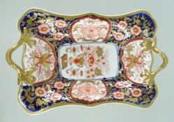 A SWANSEA PORCELAIN CENTRE DISH WITH TWIG HANDLES of footed form, decorated in 'Imari' pattern No.