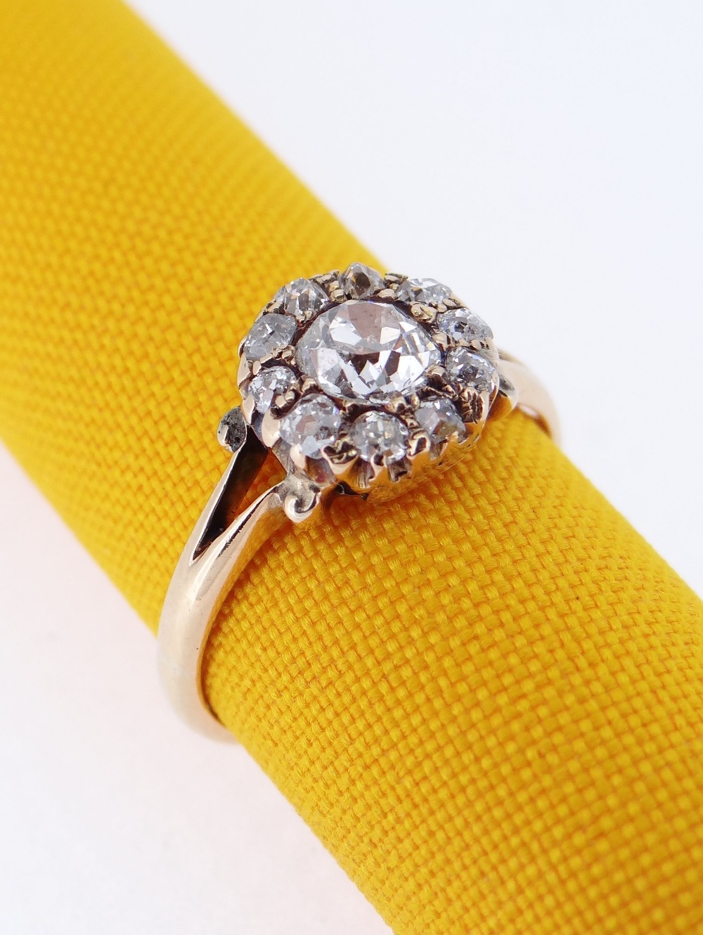 YELLOW METAL DIAMOND CLUSTER RING, the central stone 0.4cts approx. (visual estimate), surrounded by - Image 3 of 4
