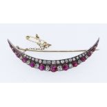 FINE DIAMOND & RUBY ENCRUSTED CRESCENT BROOCH, the forty-eight graduated stones set in yellow and