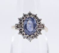 18CT GOLD SAPPHIRE & DIAMOND CLUSTER RING, the central oval sapphire 8 x 6 mm surrounded by ten