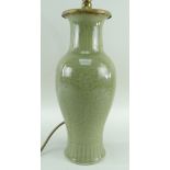 CHINESE MING-STYLE CELADON VASE, Republic, baluster form and carved with stiff leaf collar to