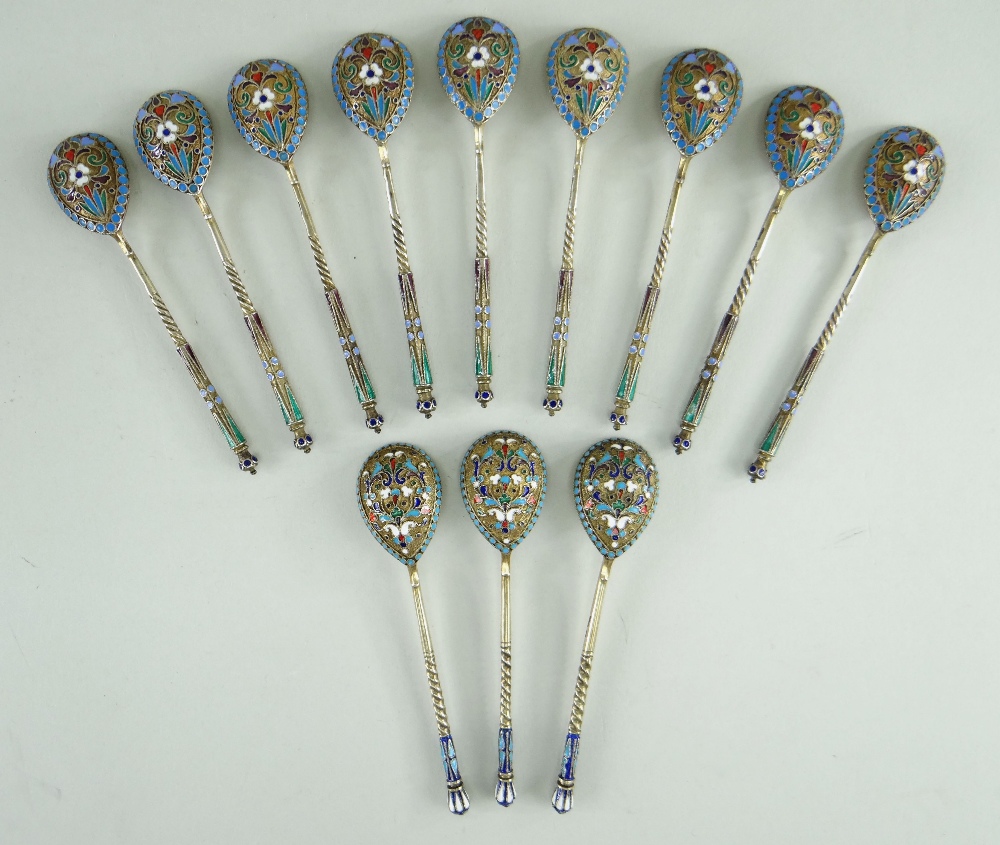 TWO SETS RUSSIAN ENAMEL & SILVER GILT TEASPOONS, 1908-1917, one a set of nine with makers mark 'EO',